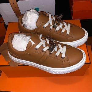 NIB Hermes Day Kelly sneakers in Gold calfskin leather with PHW 36.5